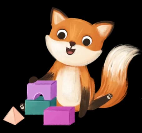 Lisek siedzi na podłodze i układa klocki – bohater Bajkowego Poddasza, który towarzyszy dzieciom w świecie audiobajek pełnym zabawy, nauki i bajkowych przygód